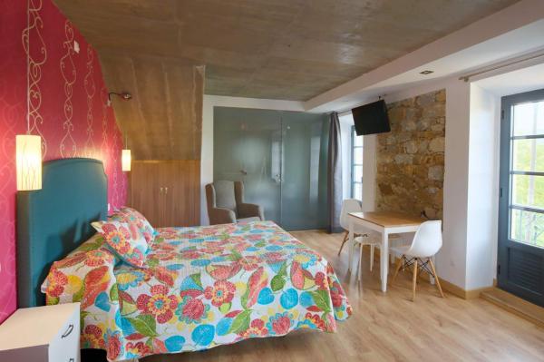 Na zdjęciu widoczny jest obiekt APARTAMENTOS LA LLONGAR położony w mieście Cardes.
