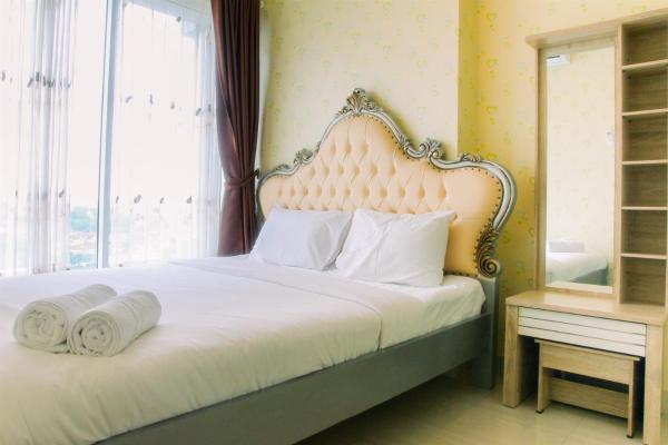 Στη φωτογραφία φαίνεται το αντικείμενο Vintage 2BR Apartment at Grand Kamala Lagoon By Travelio που βρίσκεται στην πόλη Pulosirih.