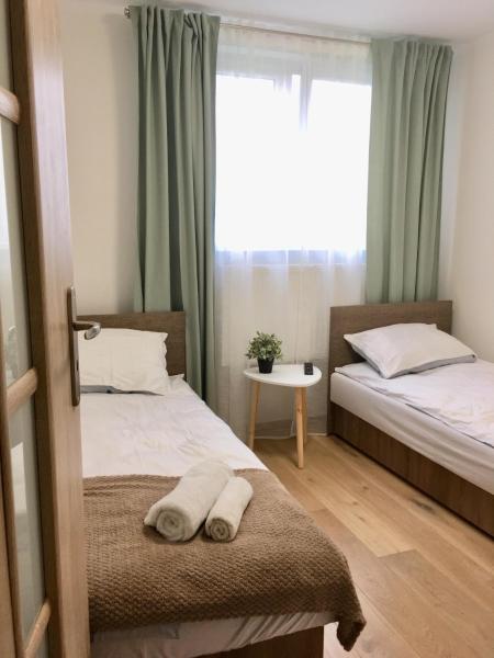 Na zdjęciu widoczny jest obiekt Apartament 212 położony w mieście Lasek.