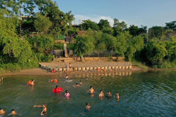 A la foto es mostra l'objecte Village House situat a la ciutat de Tam Trang.