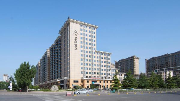 На фото показан объект Atour Hotel (Houma Xintian Square), расположенный в городе Houma.