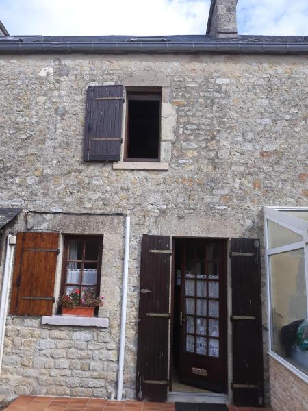 Na fotografii je vidět objekt Cottage des Veys nacházející se ve městě Pouppeville.
