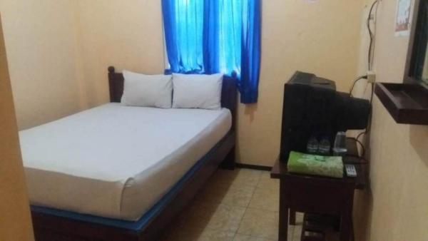 La photo montre l'objet Penginapan Hotel Mangir Asri situé dans la ville de Giaoag.