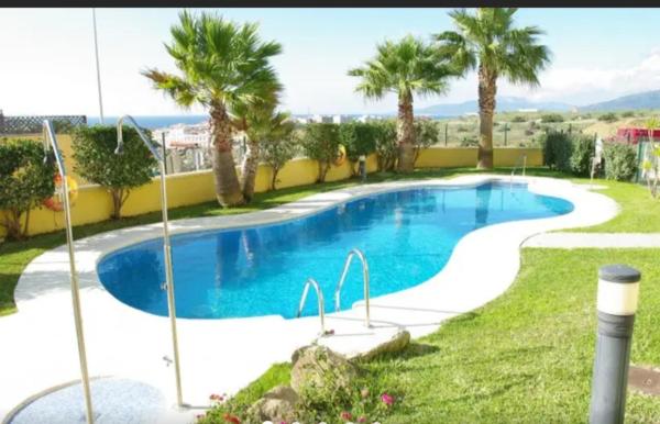 A la foto es mostra l'objecte Coqueto estudio con acceso a piscina situat a la ciutat de Tarifa.