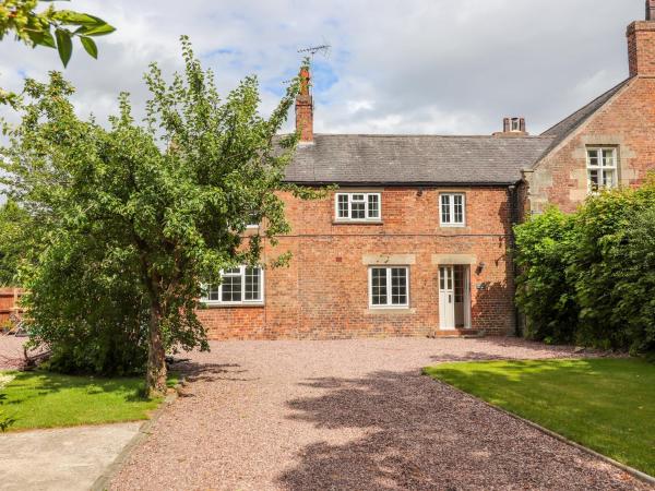 A la foto es mostra l'objecte Well House Farm Flat 1 situat a la ciutat de Broughton.