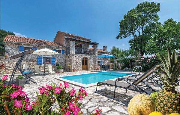 The photo shows the Lovely Home In Puntera located in the city of Puntera.