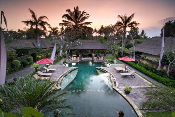The photo shows the FuramaXclusive Resort & Villas, Ubud located in the city of Abeansemal.
