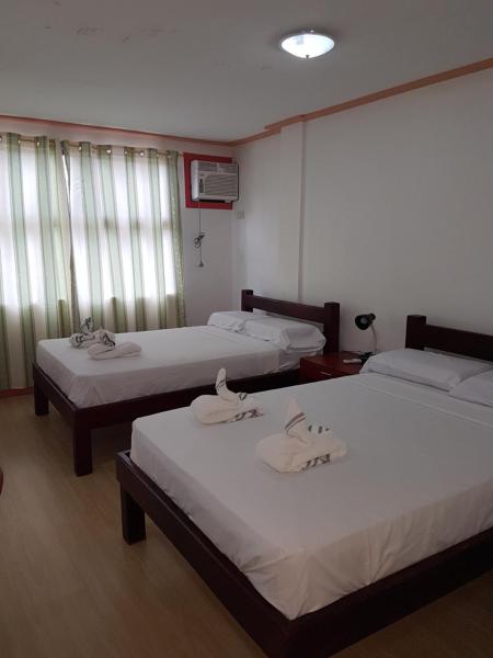 Na fotografii je vidět objekt Catalina`s Inn family room nacházející se ve městě Panglao.