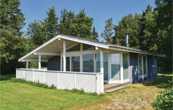 A la foto es mostra l'objecte Three-Bedroom Holiday Home In Humble situat a la ciutat de Humble.