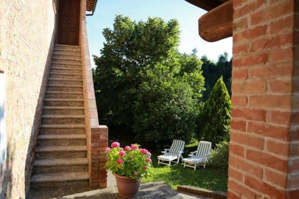 På billedet ses objektet “Il Nespolino” Tuscan Country House beliggende i byen Siena.