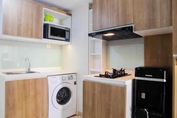 Foto 4: 2BR with Sofa Bed at Springlake Summarecon Apartment By Travelio