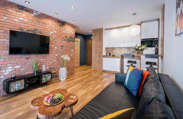 Na zdjęciu widoczny jest obiekt Apartament Merkury z parkingiem położony w mieście Toruń.