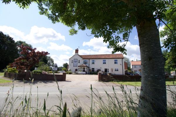 A la foto es mostra l'objecte The Plough Inn situat a la ciutat de Hevingham.