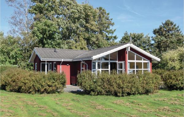 A la foto es mostra l'objecte Three-Bedroom Holiday Home In Humble situat a la ciutat de Humble.