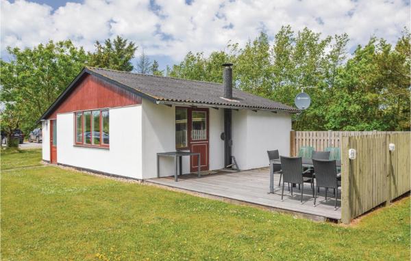 På bilden syns objektet Holiday Home Oksbøl With Fireplace 02 som ligger i staden Vejers Strand.