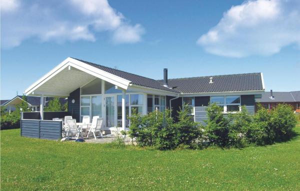 A la foto es mostra l'objecte Holiday Home Strandparken situat a la ciutat de Otterup.