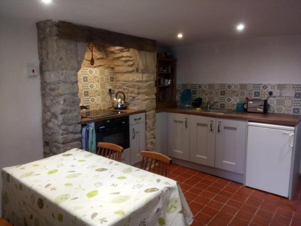 På billedet ses objektet Swan walkers cottage beliggende i byen Dyrham.