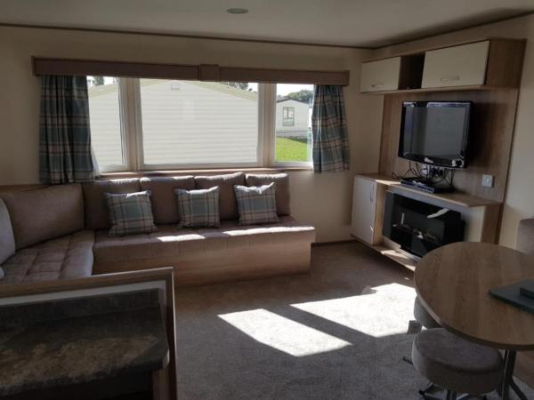 Na fotografii je vidět objekt Gold Plus Caravan nacházející se ve městě Dymchurch.