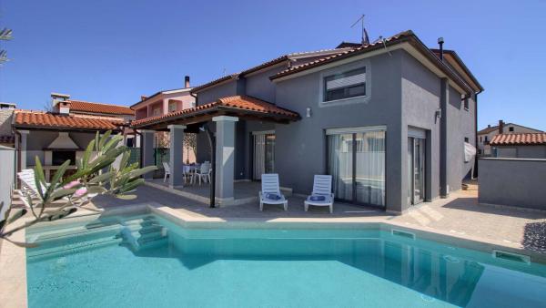 A la foto es mostra l'objecte Charming Villa Verde with private pool in Pula, extra POOL HEATING by WiiBuk situat a la ciutat de Pula.