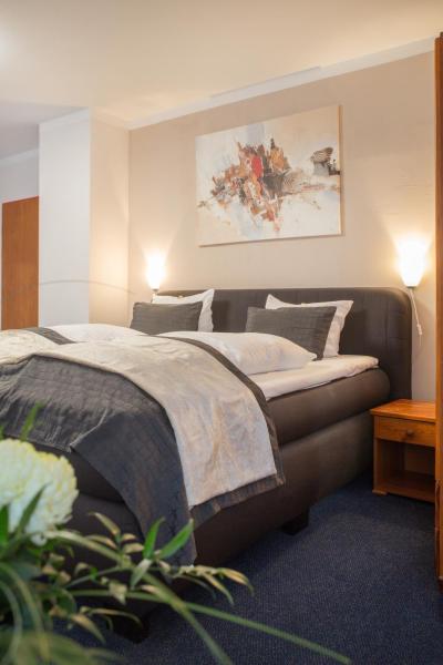 The photo shows the Hotel Nordig free parking located in the city of Flensburg.