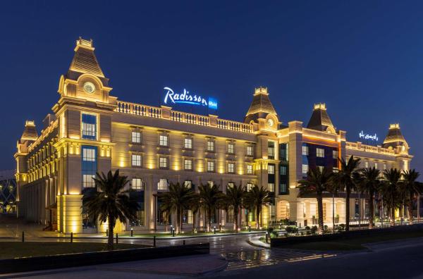 The photo shows the Radisson Blu Hotel, Ajman located in the city of Ajman .