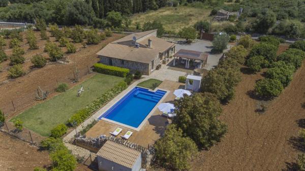 A la foto es mostra l'objecte Villa Es Moya des Pins situat a la ciutat de Muro.