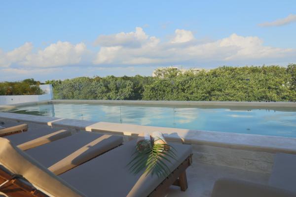 Na zdjęciu widoczny jest obiekt Hotel Blanco Tulum Adults Only położony w mieście Tulum.