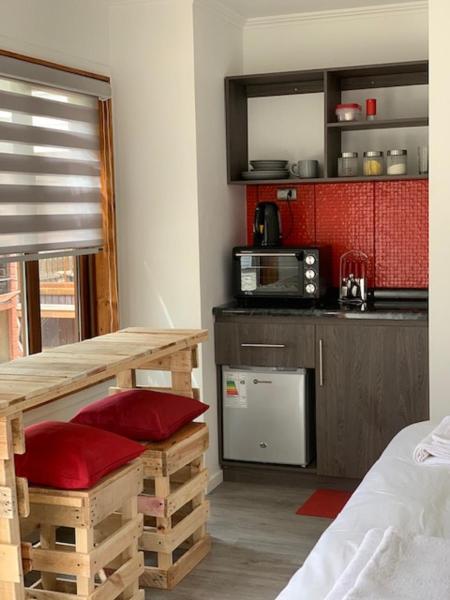 A la foto es mostra l'objecte Rumbo Suites situat a la ciutat de Punta Arenas.