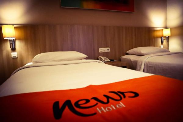 The photo shows the News Hotel Waru Sidoarjo located in the city of Waru.