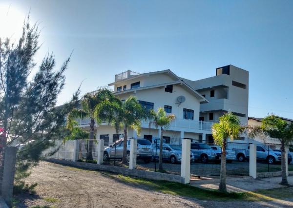 Na fotografii je vidět objekt Apartamento Ilha do Coral nacházející se ve městě Palhoça.
