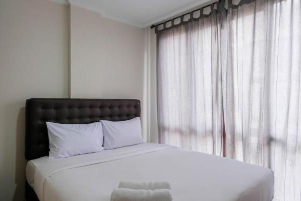 写真にはPagedangan市にあるConvenient and Luxurious 2BR Asatti Apartment By Travelioが写っています。