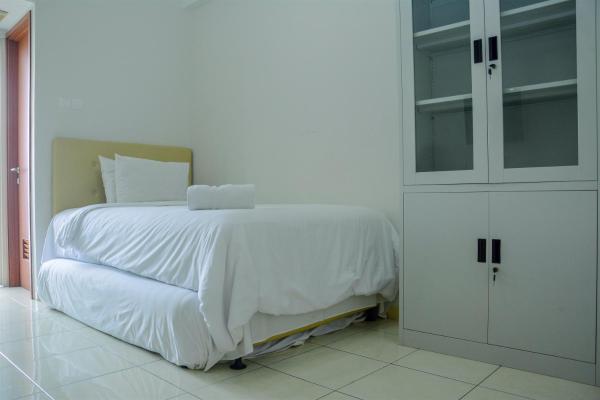 Op de foto is het object Cozy Studio Apartment at Margonda Residence 4 By Travelio te zien, gelegen in de stad Mampangkali.