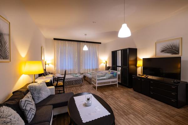 Na fotografii je vidět objekt Apartmán U Křížku nacházející se ve městě Vílanec.