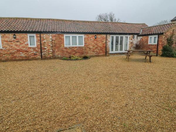 A la foto es mostra l'objecte Peardrop Cottage situat a la ciutat de Manby.