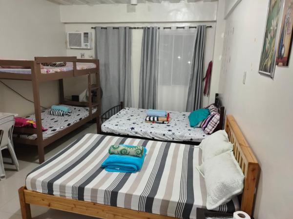 A la foto es mostra l'objecte Mhavic family room ,group friend good for 6 guest situat a la ciutat de Manila.