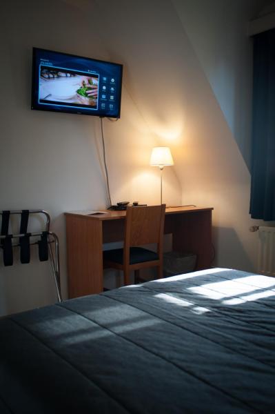 The photo shows the JFK Hotel Zelzate - Gent located in the city of Zelzate.