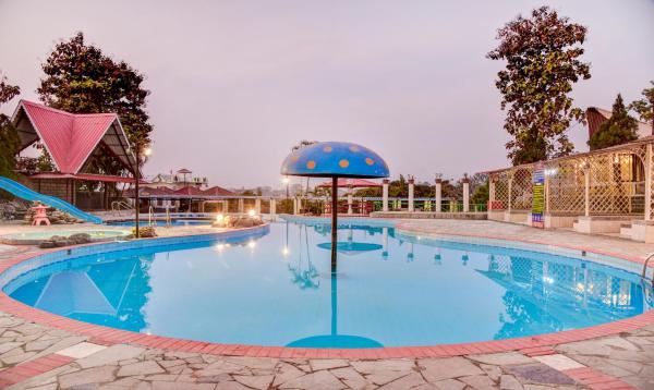 A la foto es mostra l'objecte Treebo Premium Blue Mountain Country Club And Resort situat a la ciutat de Siliguri.