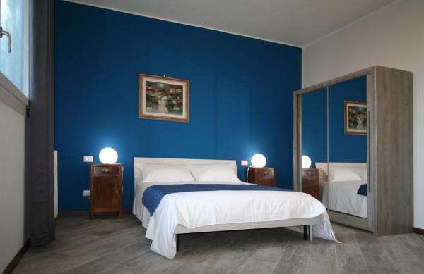 En la foto se muestra el objeto SanSiroFiera Rooms ubicado en la ciudad de Milán.