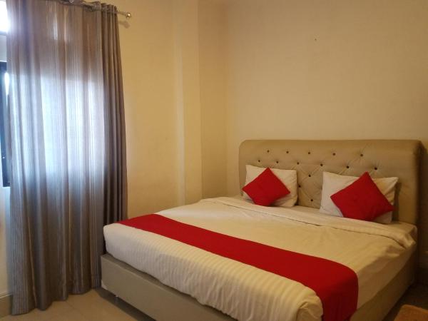 The photo shows the Mina Homestay Syariah located in the city of Bukittinggi.