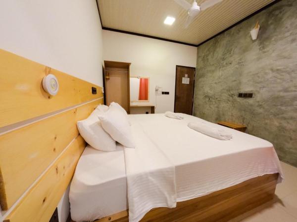照片显示了位于Fulidhoo市的Huvan Inn物件。