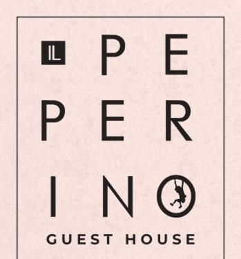 The photo shows the Il Peperino GuestHouse located in the city of Viterbo.