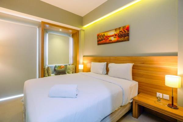A la foto es mostra l'objecte Stylish and Cozy Studio No Kitchen Apartment Mustika Golf Residence By Travelio situat a la ciutat de Cikarang.