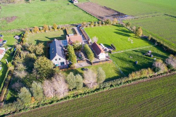Na zdjęciu widoczny jest obiekt Vakantiehoeve De Klepperij położony w mieście Woumen.