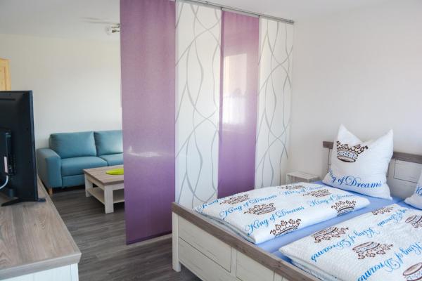 A la foto es mostra l'objecte Ferienwohnung Landquartier situat a la ciutat de Windesheim.