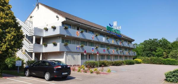 A la foto es mostra l'objecte Brit Hotel Confort Nancy Lunéville situat a la ciutat de Franconville.