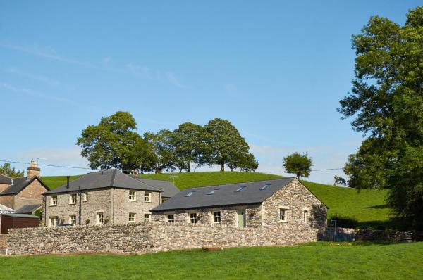 A la foto es mostra l'objecte Helm Mount Lodge & Cottages situat a la ciutat de Natland.