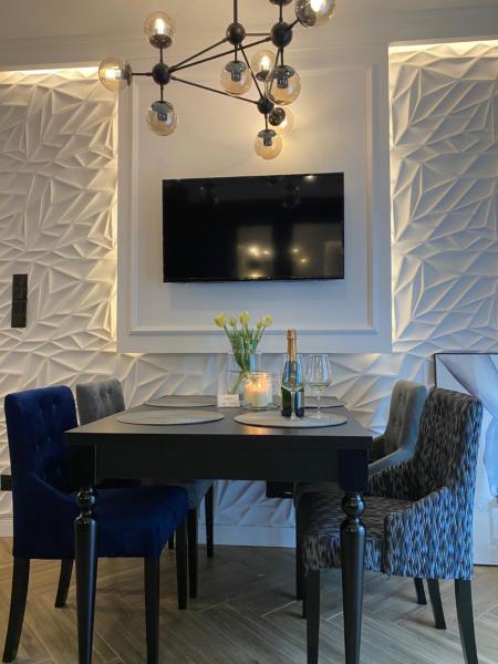 A la foto es mostra l'objecte Family & Business Sauna Apartments No 6 Leśny nad Zalewem Cedzyna - 1 Bedroom with Private Sauna, Terrace, Parking, Catering Options situat a la ciutat de Kielce.