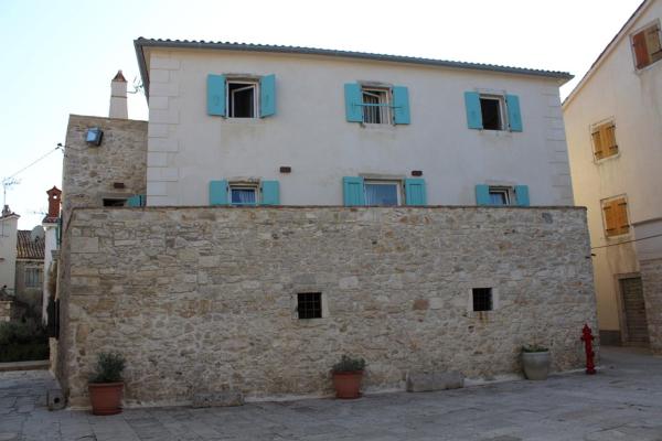 Na foto é possível ver o objeto Sansego Suites localizado na cidade de Susak.