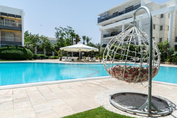 דירת גן פונה לבריכה - pool garden view eilat, Эйлат