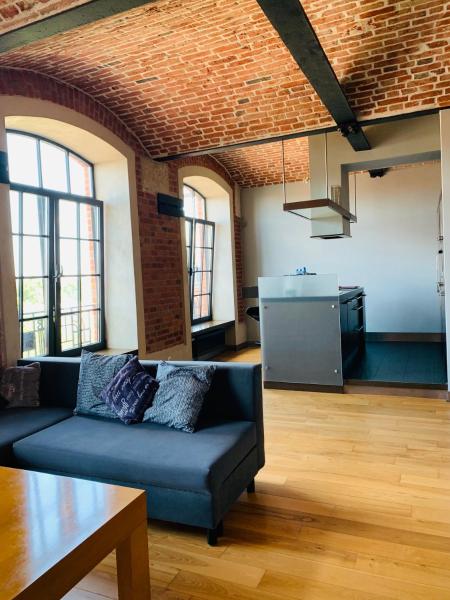 Na zdjęciu widoczny jest obiekt Apartament Stara Przędzalnia położony w mieście Smolarnia.